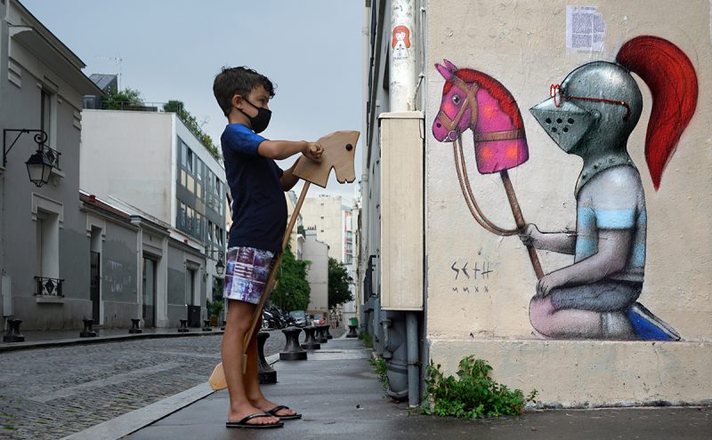 French artist Julien Malland with a new series of murals that capture the innocence of childhood. 5 800x495 2