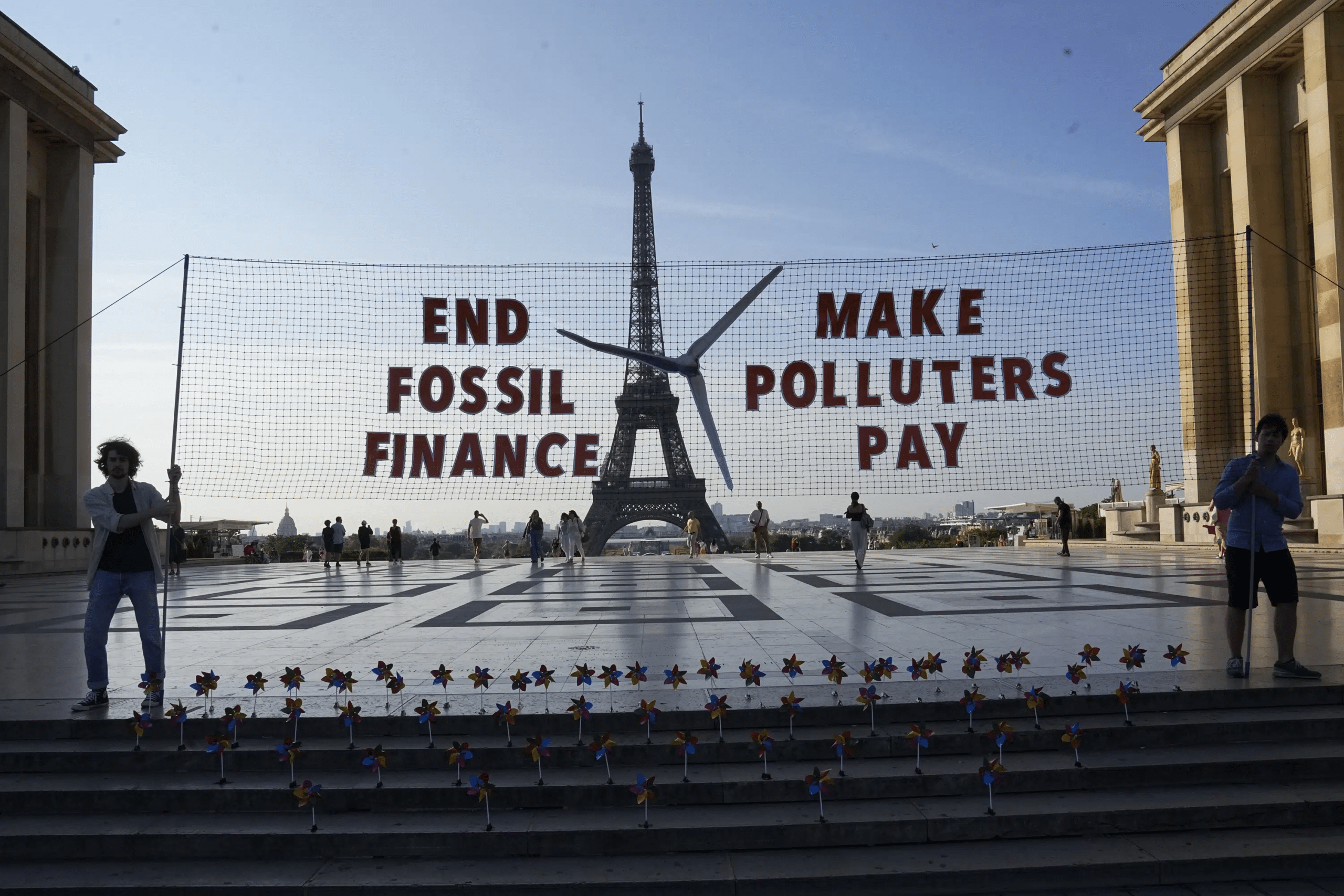 قمة باريس.. ماكرون يحث على زيادة التمويل المناخي